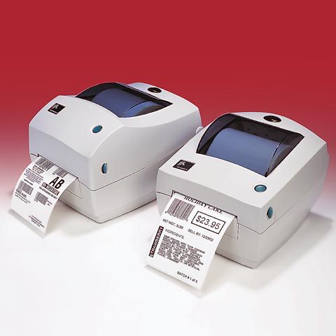 Two label printers printing labels